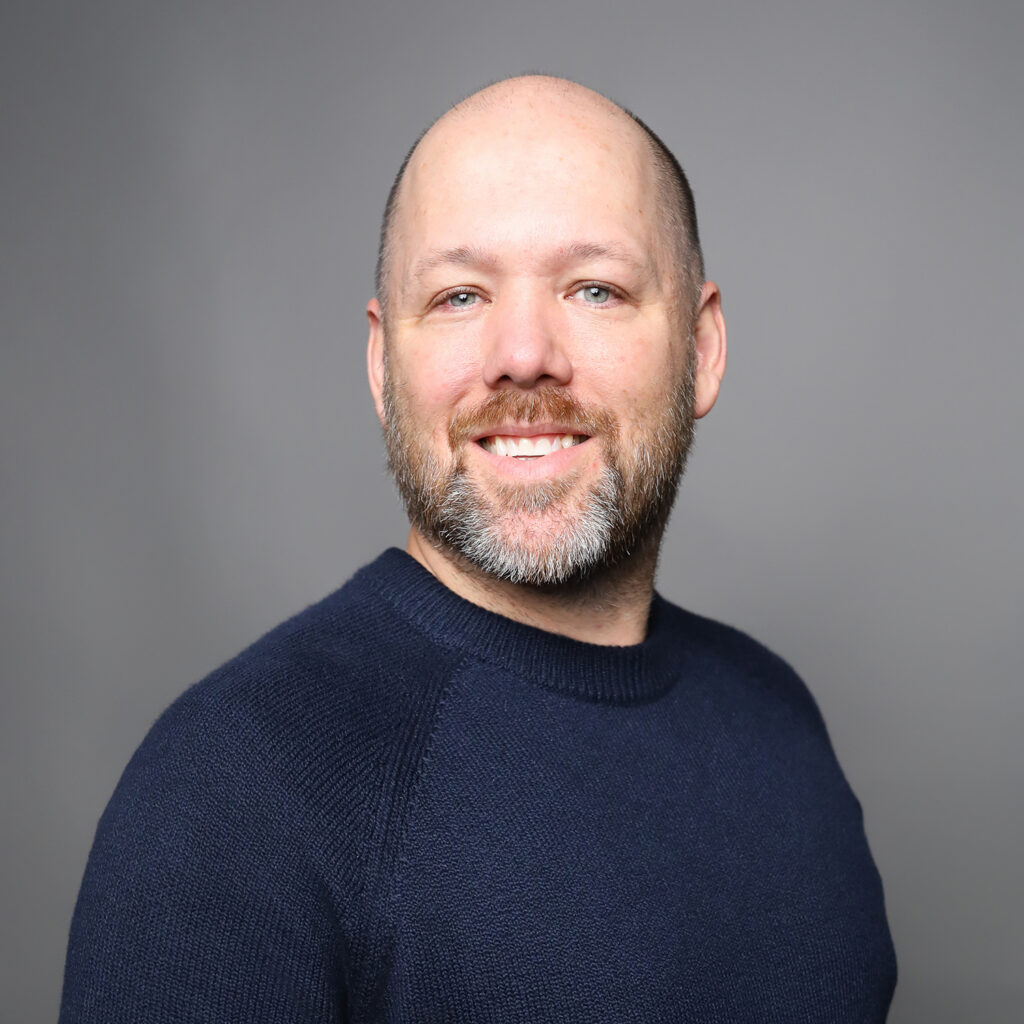 Headshot of Dr. Ryan Darby, Chief Services Officer at 34 Strong.